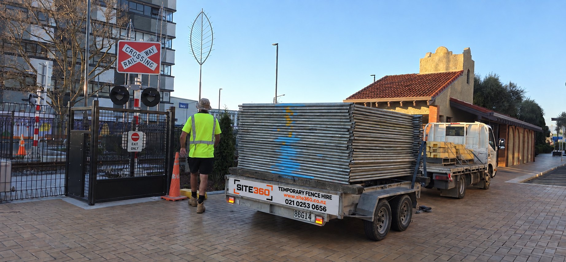 Site360 truck and trailer loaded with fence panels delivering to a job